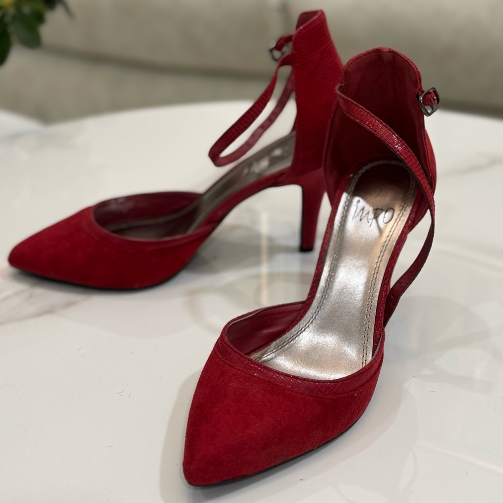 IMPO Heels 
Step out in style with these elegant red women's shoes. .